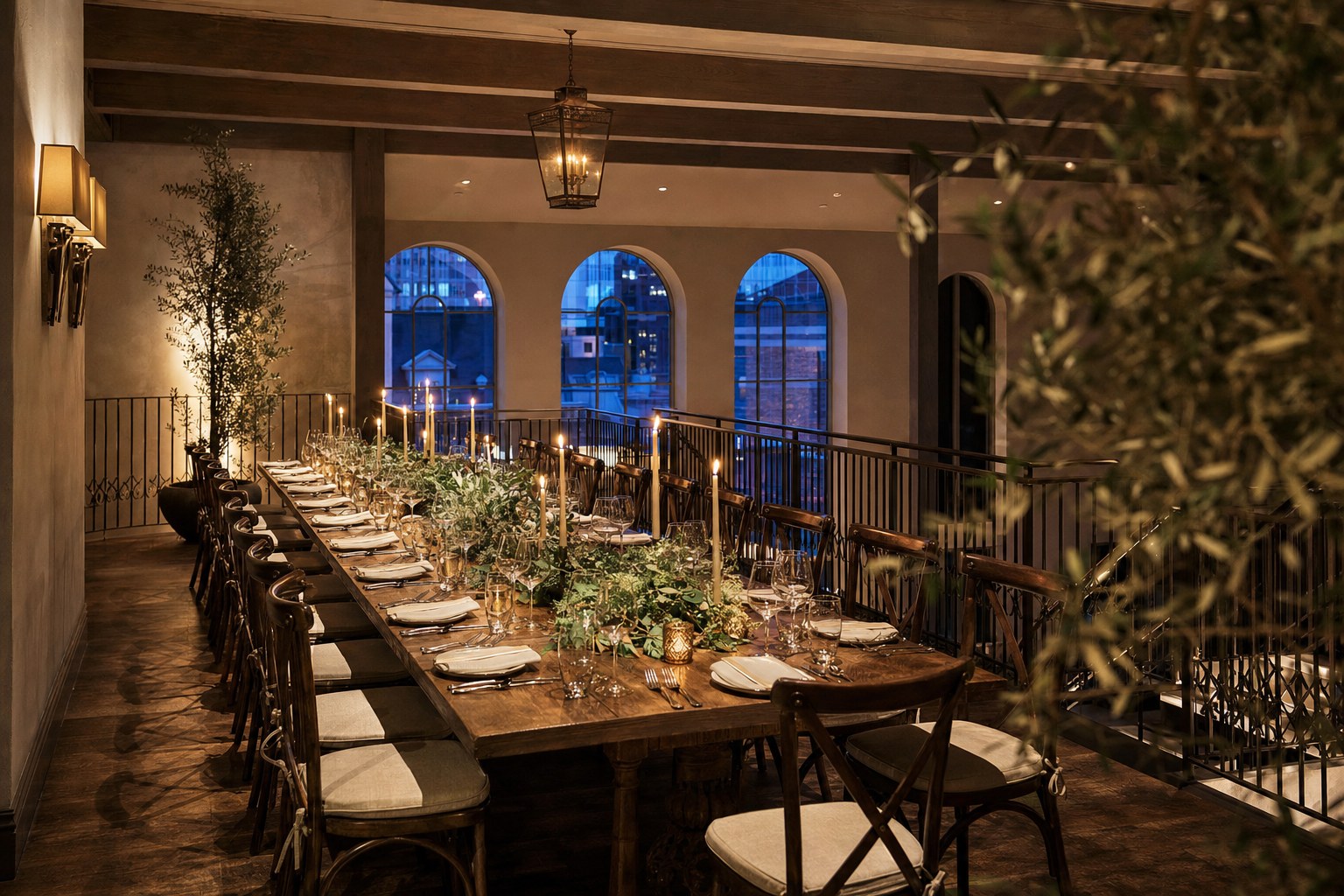 Long table set for a private dinner in the Downtown mezzanine